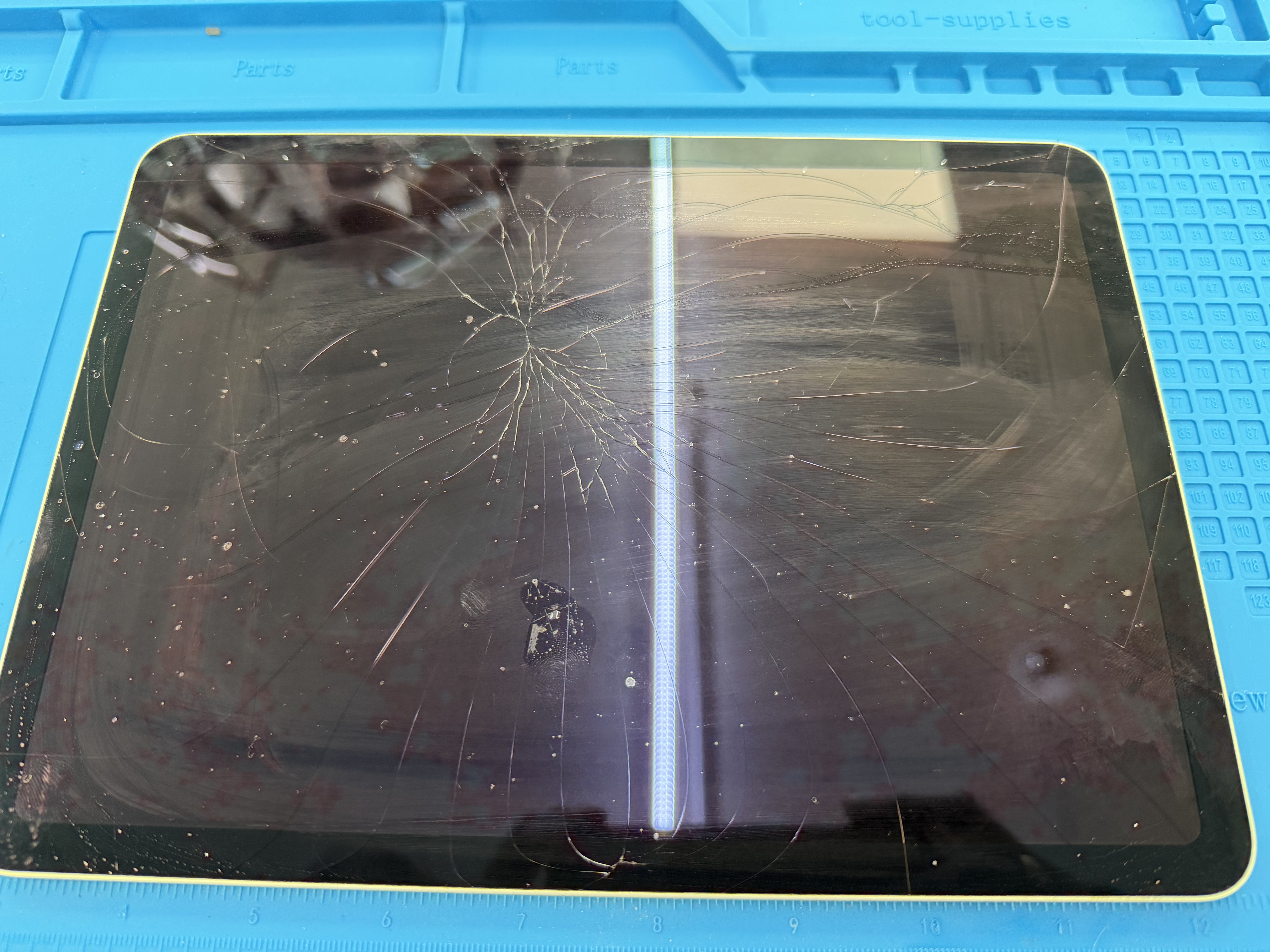 Cracked iPad screen brought in for repair at Electronics Garden Repair